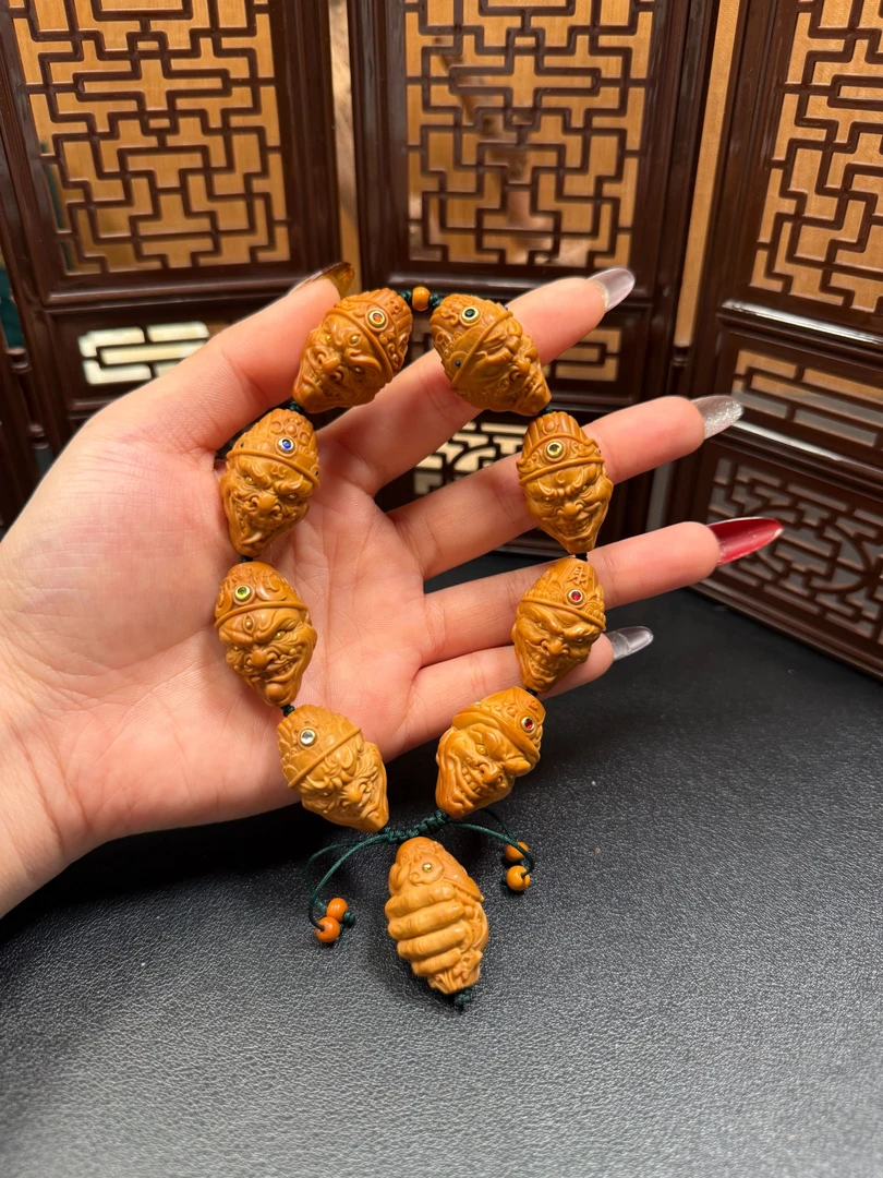 豪镶邪财橄榄核手串