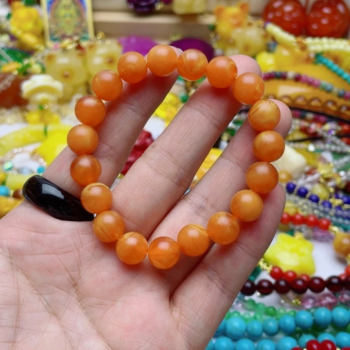 树脂制品52号橘色手链