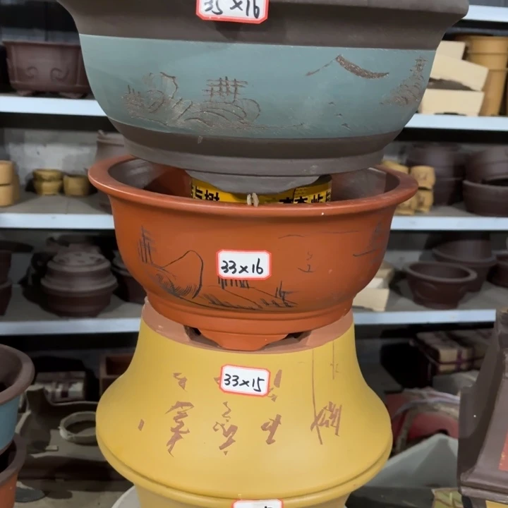 紫砂花盆100-4。