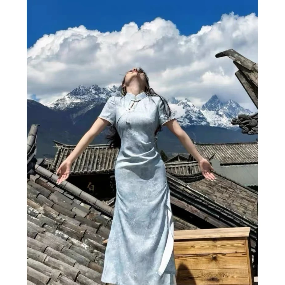 2025新中式改良新中式新款年轻款文艺蓝色提花前开叉旗袍女套装套