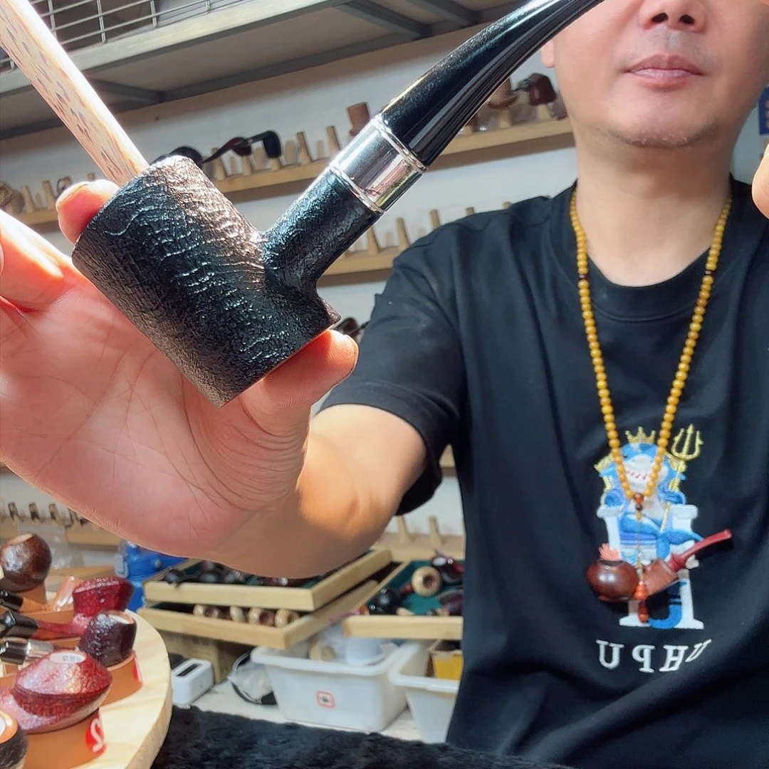 你***行焦耀烟斗一直斗