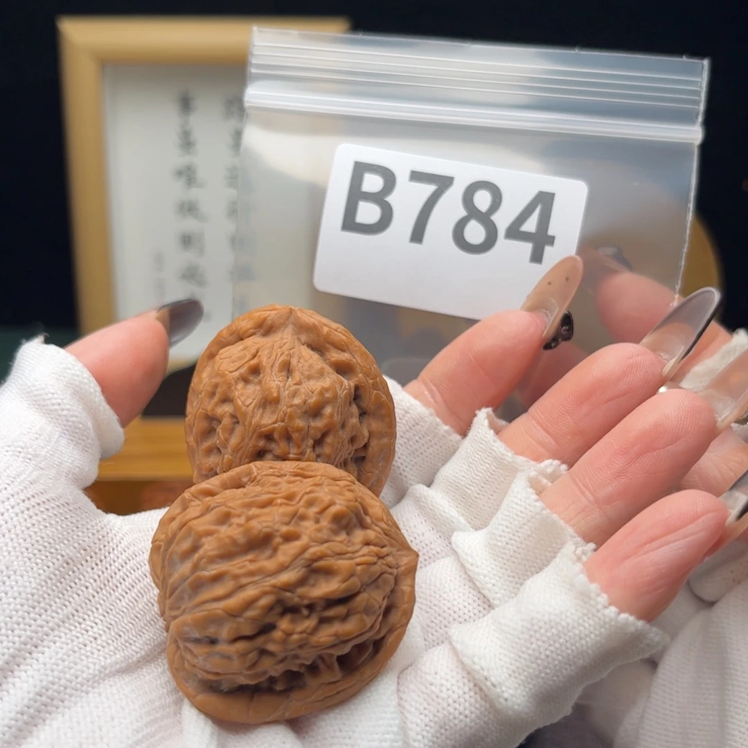 奕***改把件文玩核桃38蚂蚁王b784