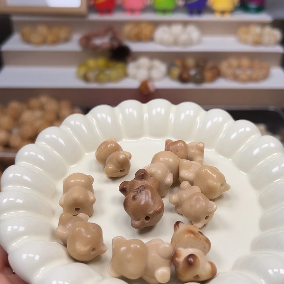 手串菩提根/象牙果瑕疵茶色暴力熊10颗有裂