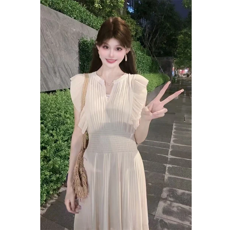 2025年夏季新款飞飞袖白色连衣裙女法式时尚气质小众显瘦收腰长裙