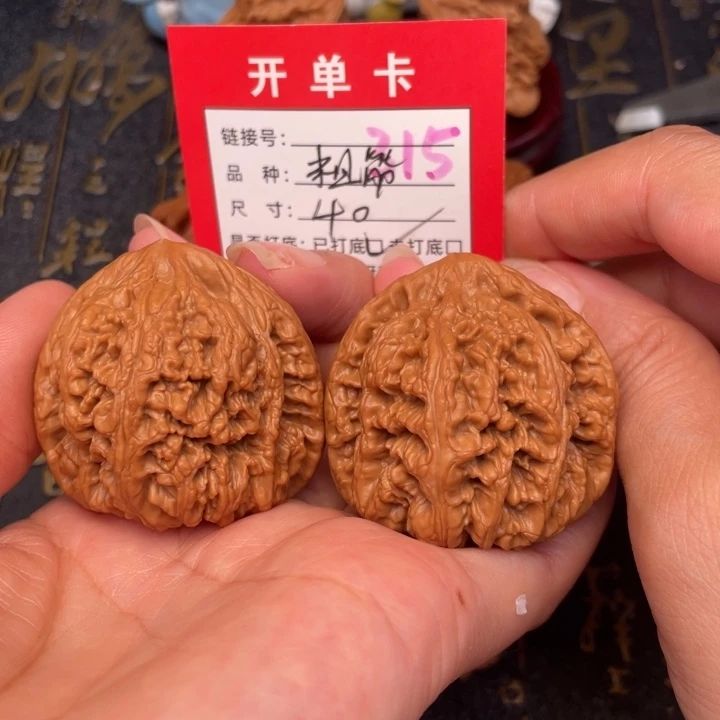 桃核吊坠文玩了吗