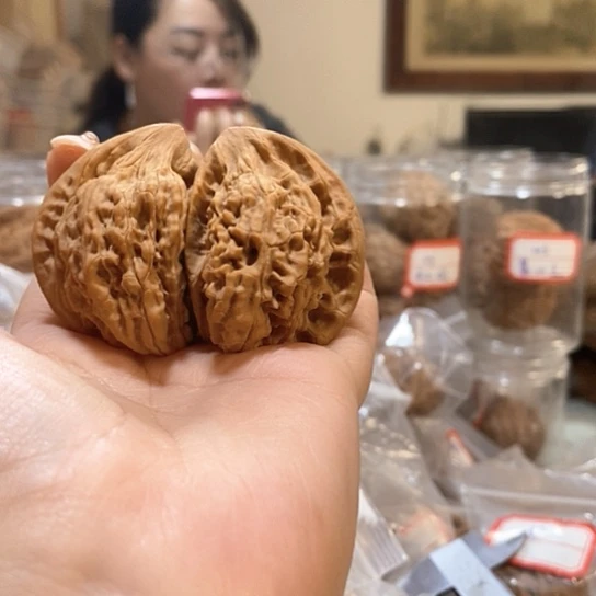 文玩核桃吊坠历**乡官帽半壁