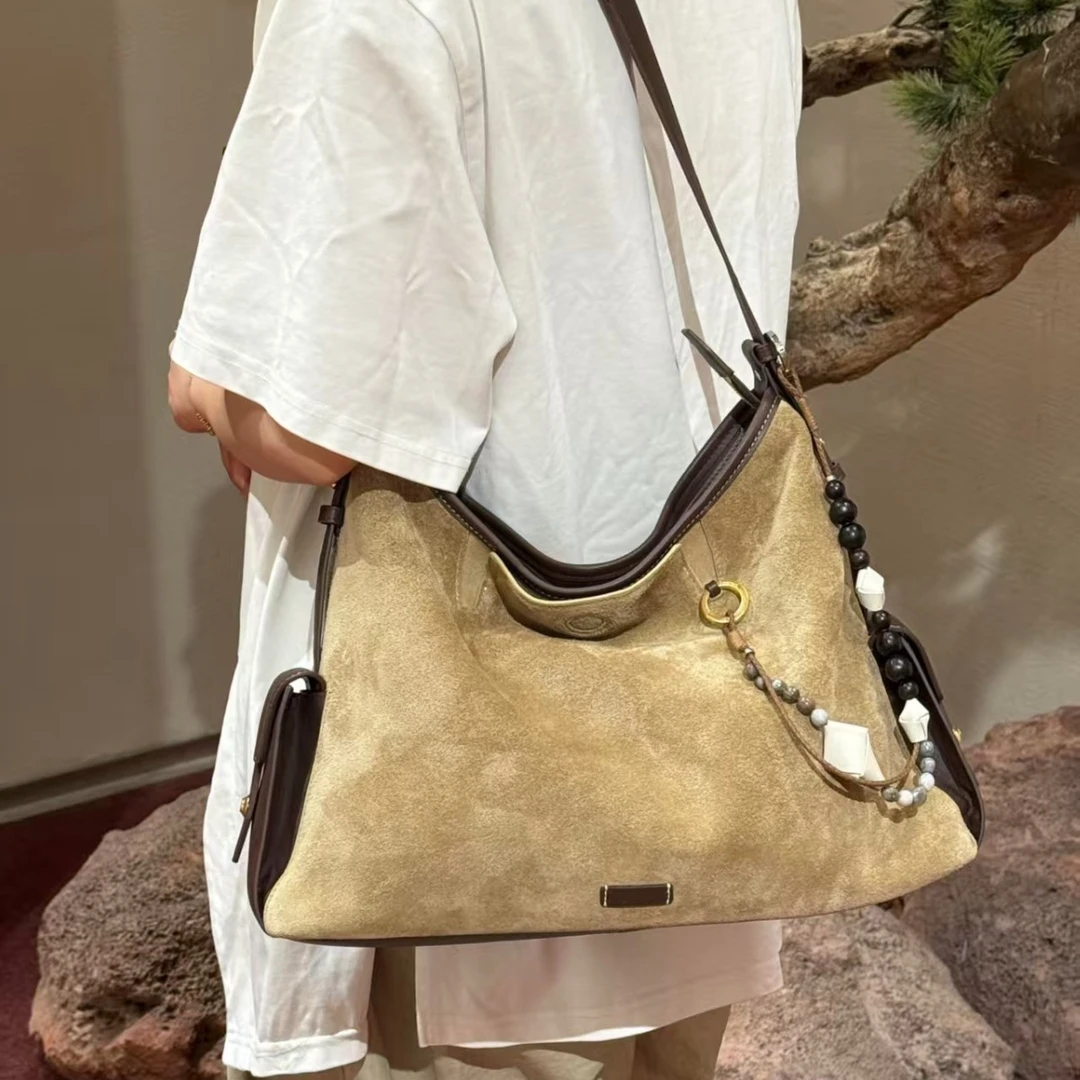 蒋奇明同款循迹旅量斜挎电脑包通行hobo包大容勤托特包女时尚便携