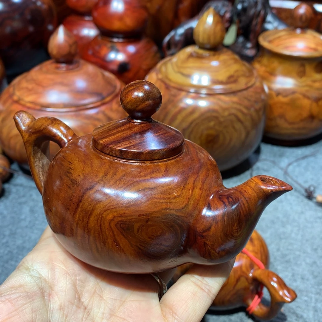 自***你木越南黄花梨紫料壶一个