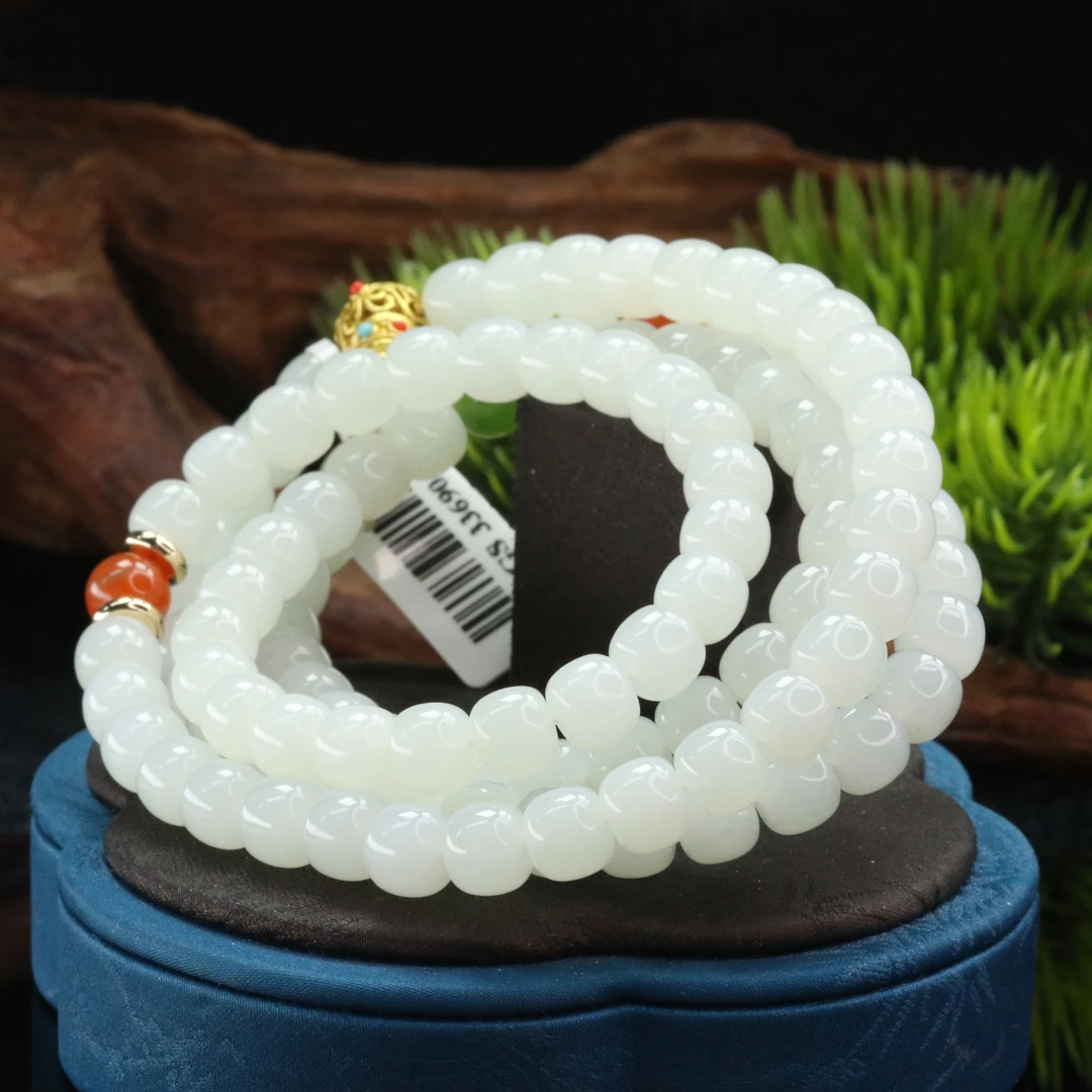 9和田玉羊脂白长串/000057北京中保拍卖