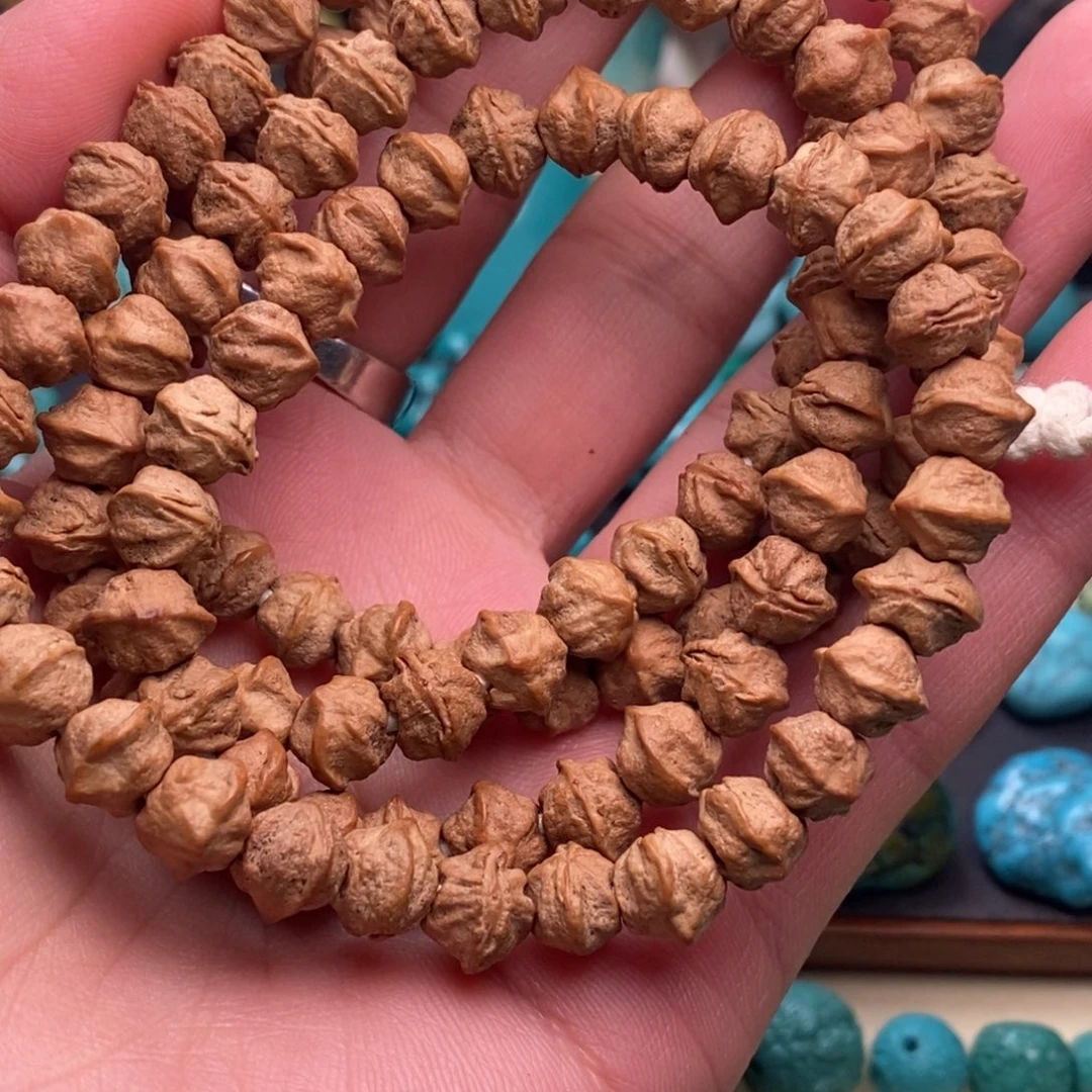 兔***北柏香籽/百香籽吊坠一一67889