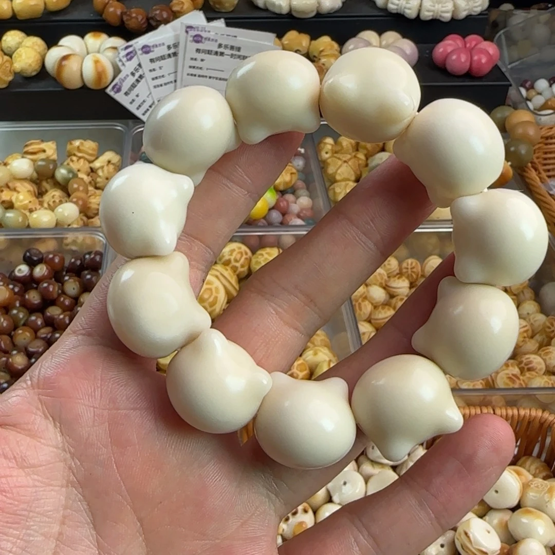 吊坠菩提根/象牙果微瑕疵小猫头手串一条
