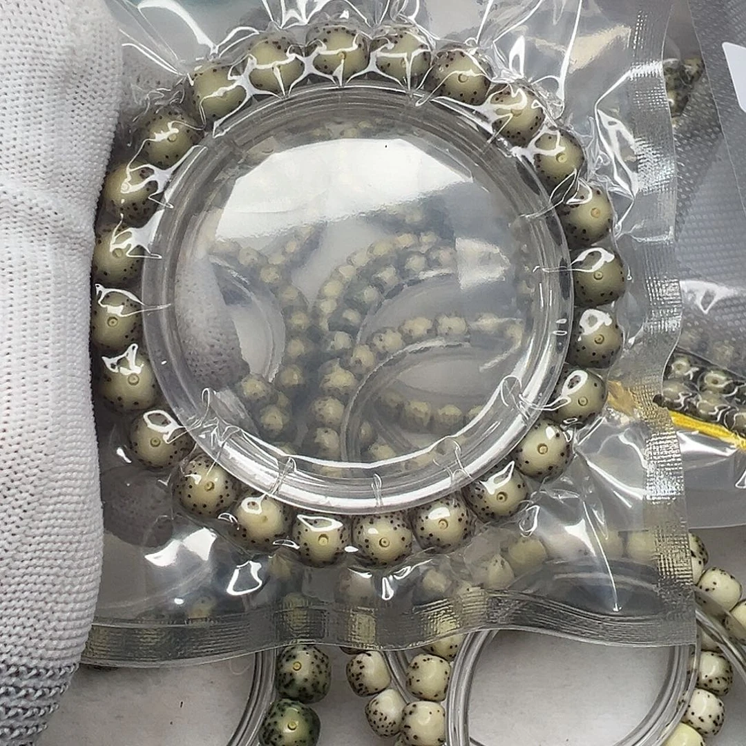 手串星月菩提9.5×8黄金瞳加侧留白  867