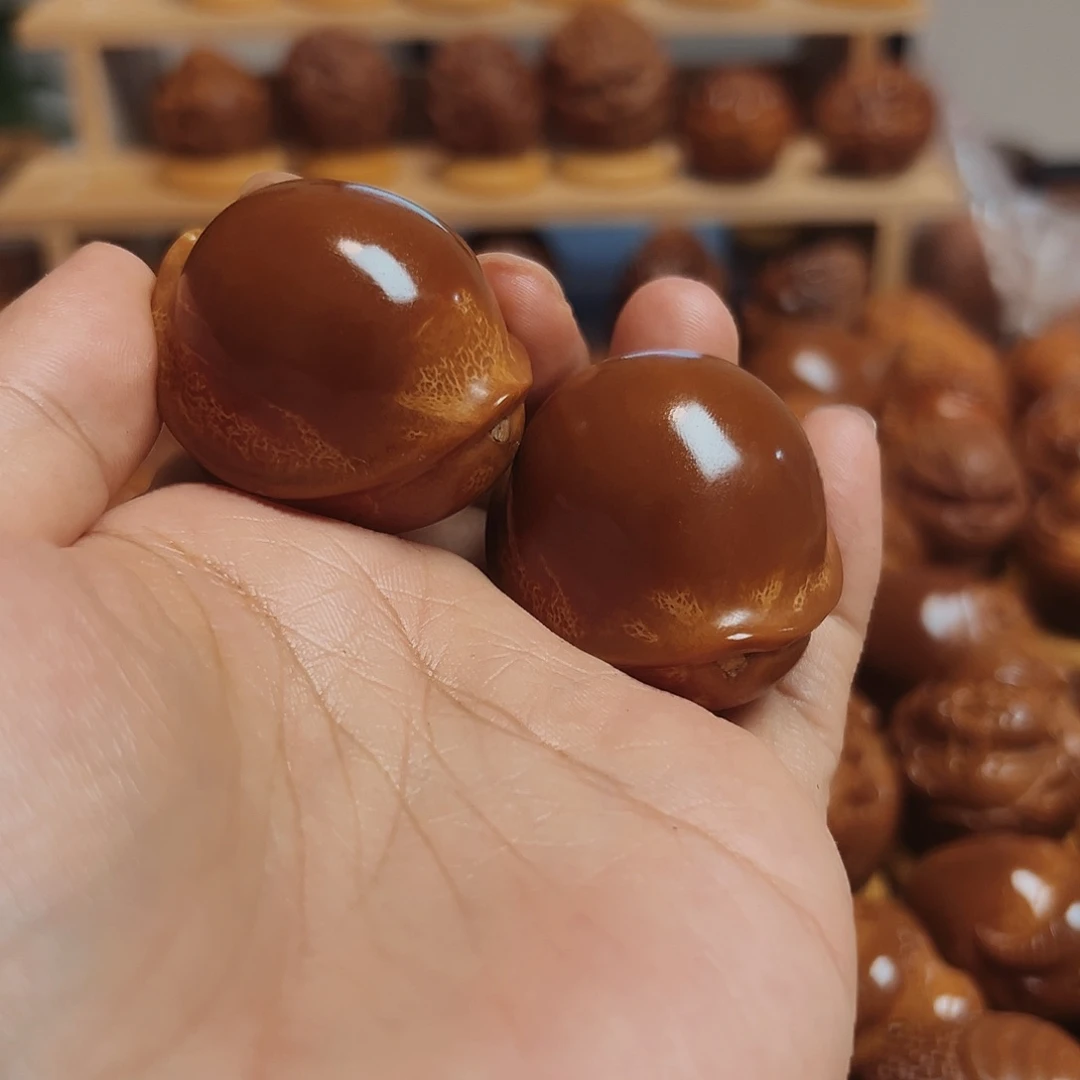 寡***人橄榄核把件元宝富甲