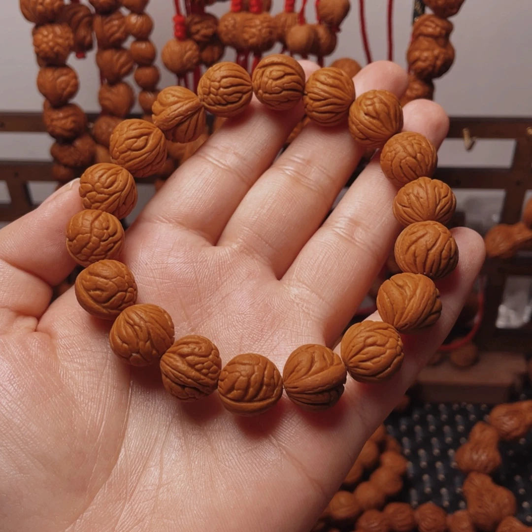 木质类龙纹桃枭手串