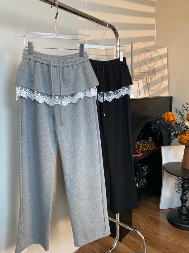 【T.T】蕾丝拼接屁帘抽绳两色休闲裤T38840