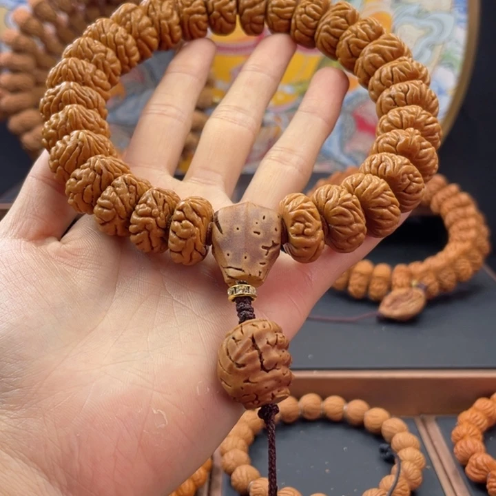 桃核手串爱***事龙纹桃核祥云