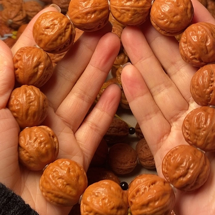 夏***风文玩核桃手串足球