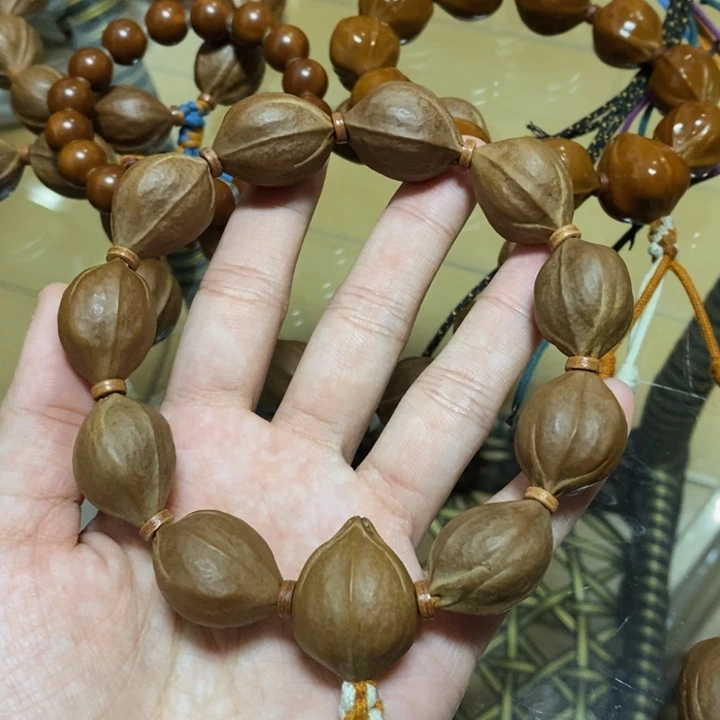 吊坠橄榄核秋*梅林铁