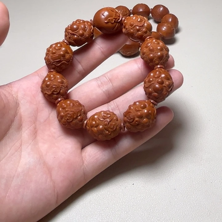 阳***我手串橄榄核三足金蟾