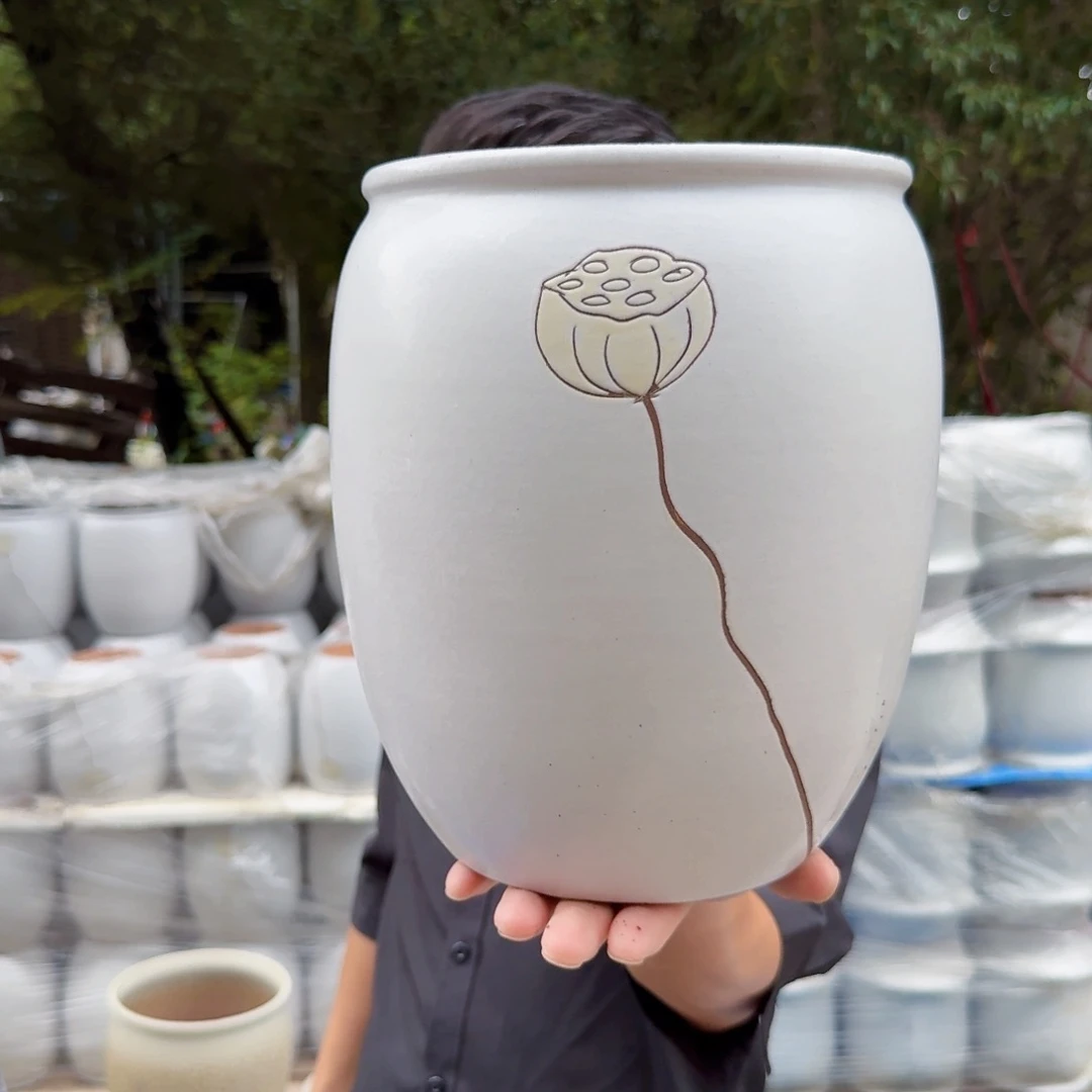 紫砂花盆口19高25（莲子刻绘一个白色
