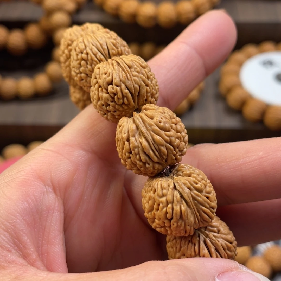 桃核手串嘿**嘿龙鳞凤尾