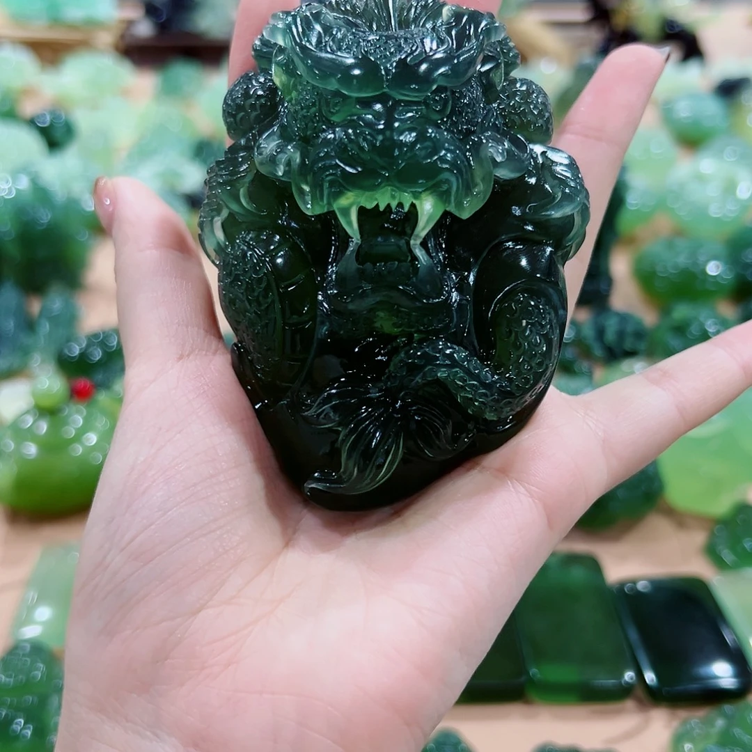 臣***岸未镶嵌蛇纹石玉手把