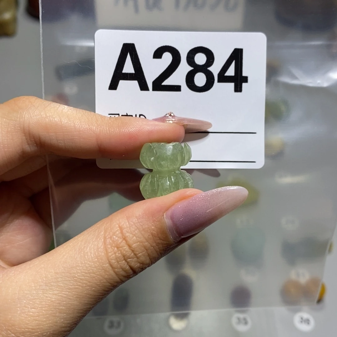 蛇纹石玉合金颈饰陀***哈