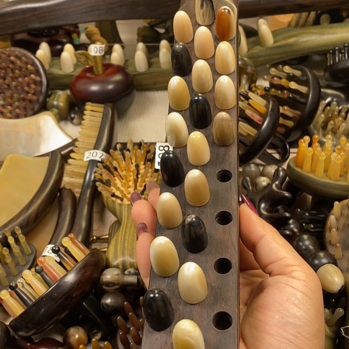 小***呱紫光檀牛角30齿赶筋棒