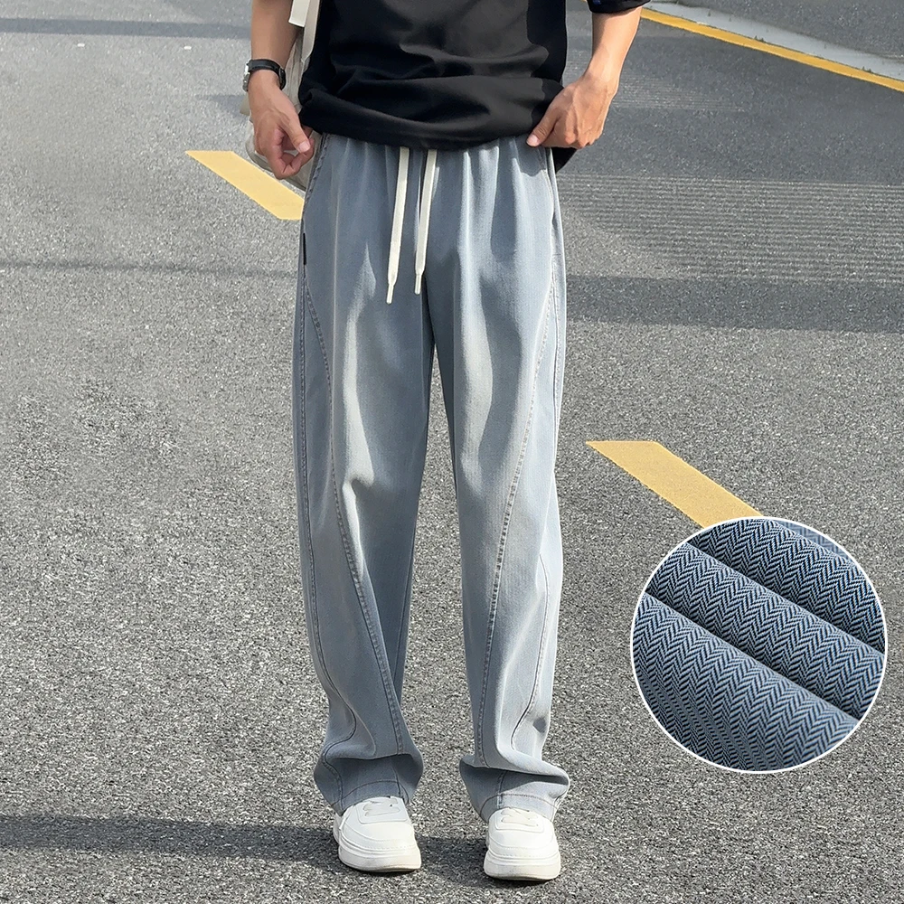 凉感蓝色莱赛尔天丝牛仔裤子男夏季阔腿宽松水洗人字纹冰丝休闲裤