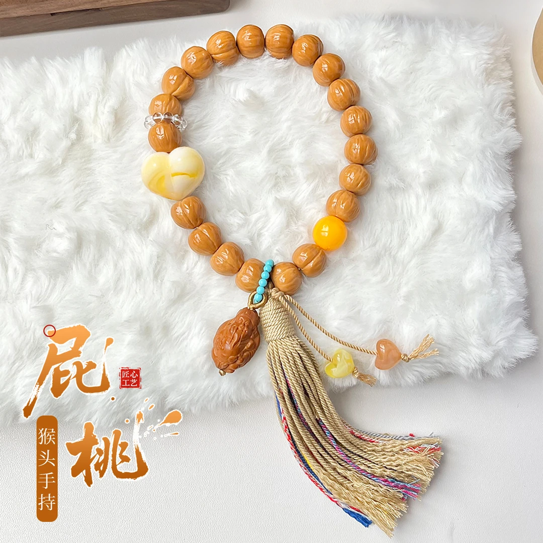 光面屁桃爱心猴头手串精工雕刻聚宝盆核桃文玩手链女屁桃手持流苏