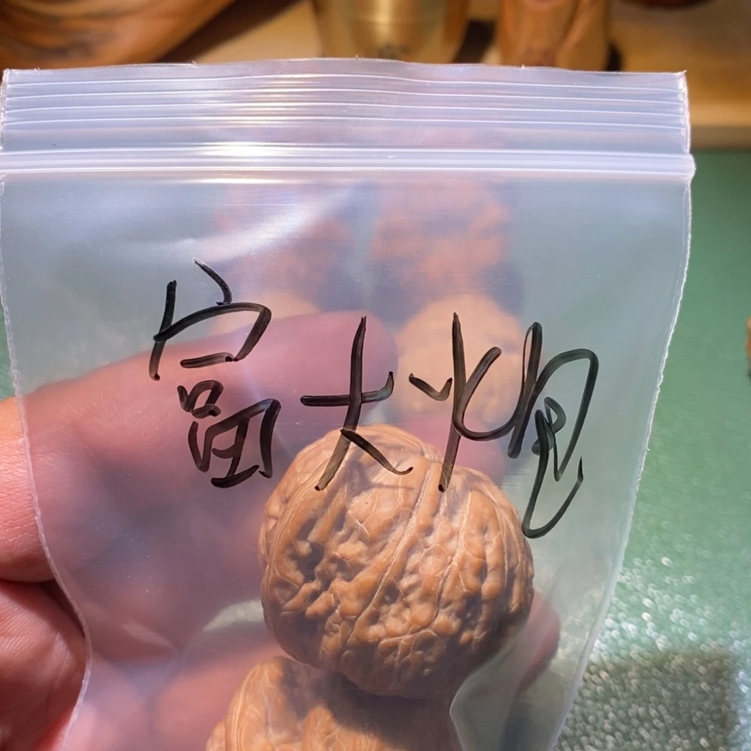 吊坠桃核富*炮铁锤一打我头
