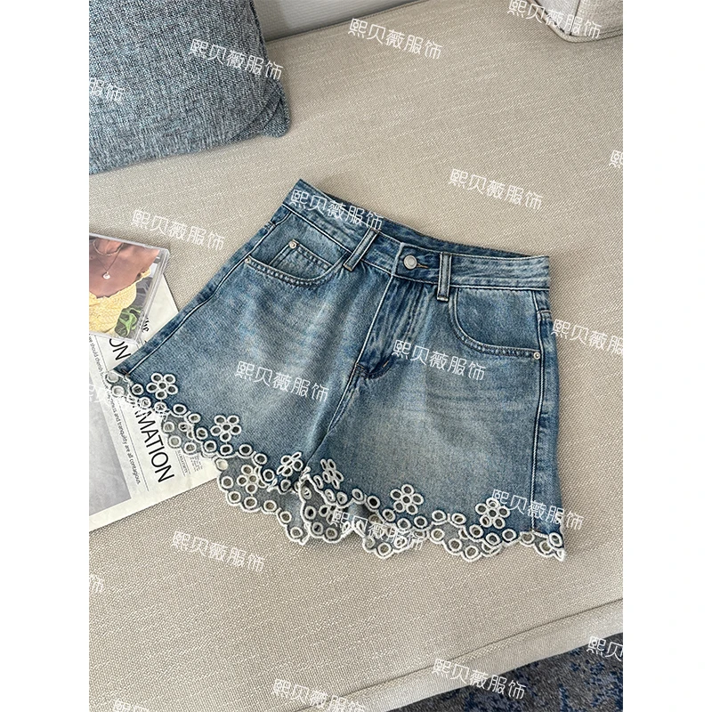 熙贝薇6 欧货刺绣镂空花瓣牛仔裤夏季设计款气质新款短裤 G7966