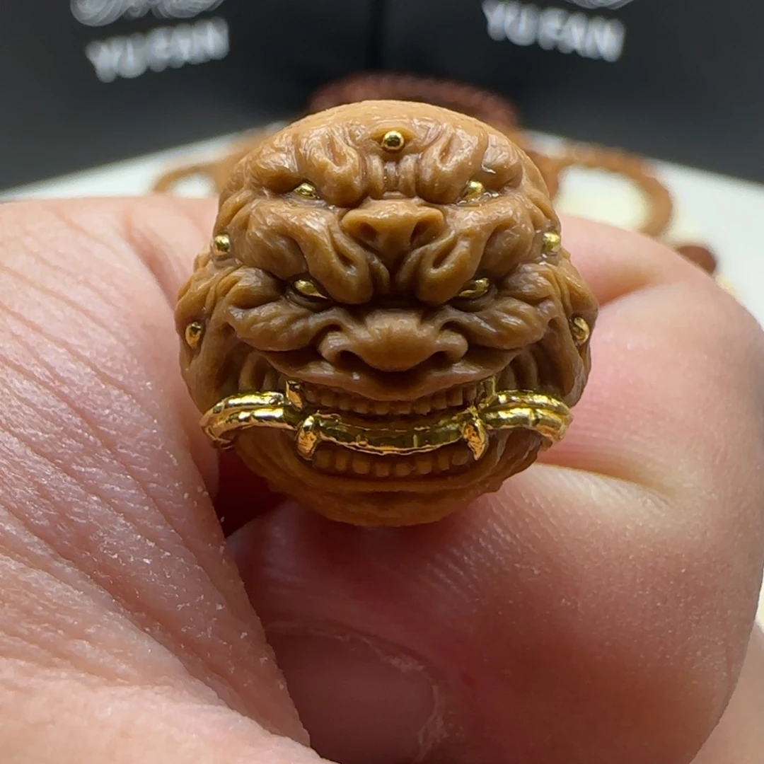 猴头核桃吊坠九目镶嵌24k