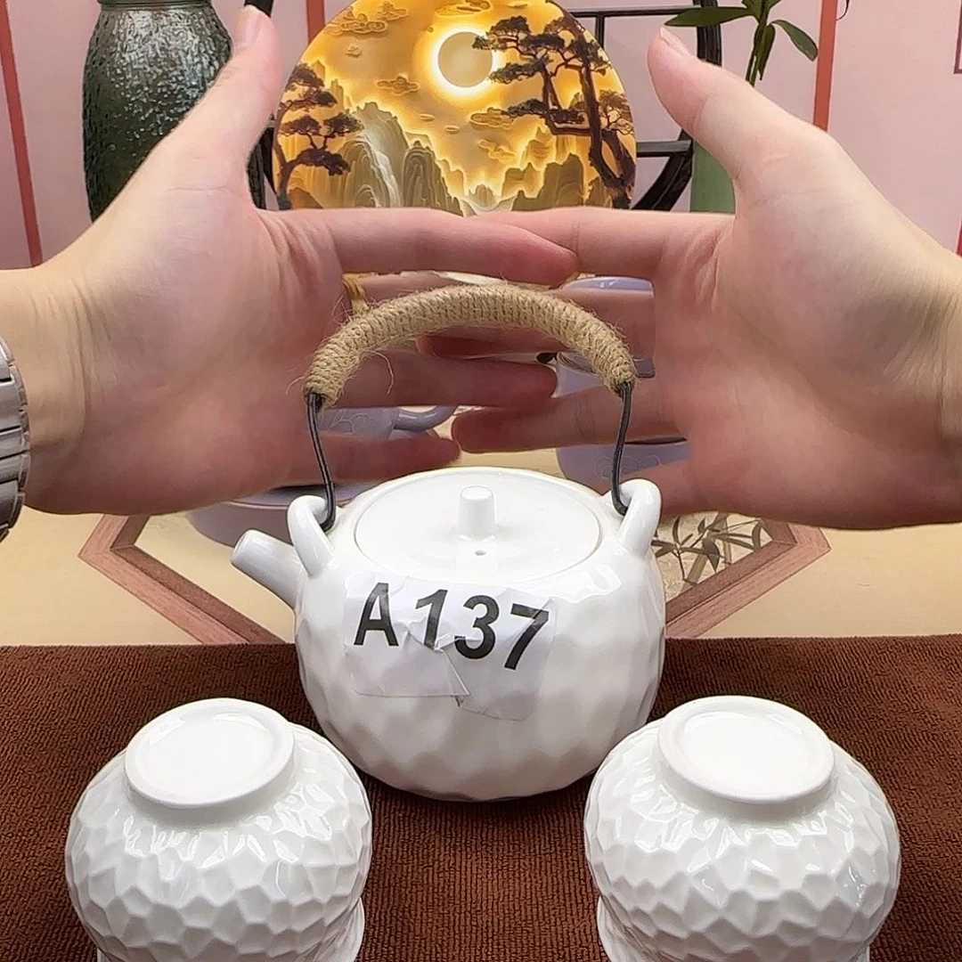 羊脂玉锤纹手工提梁一壶两杯