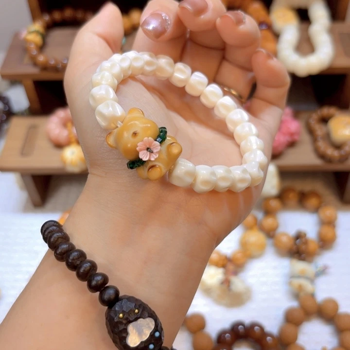 星月菩提手串牛骨百香籽10mm小熊象牙果