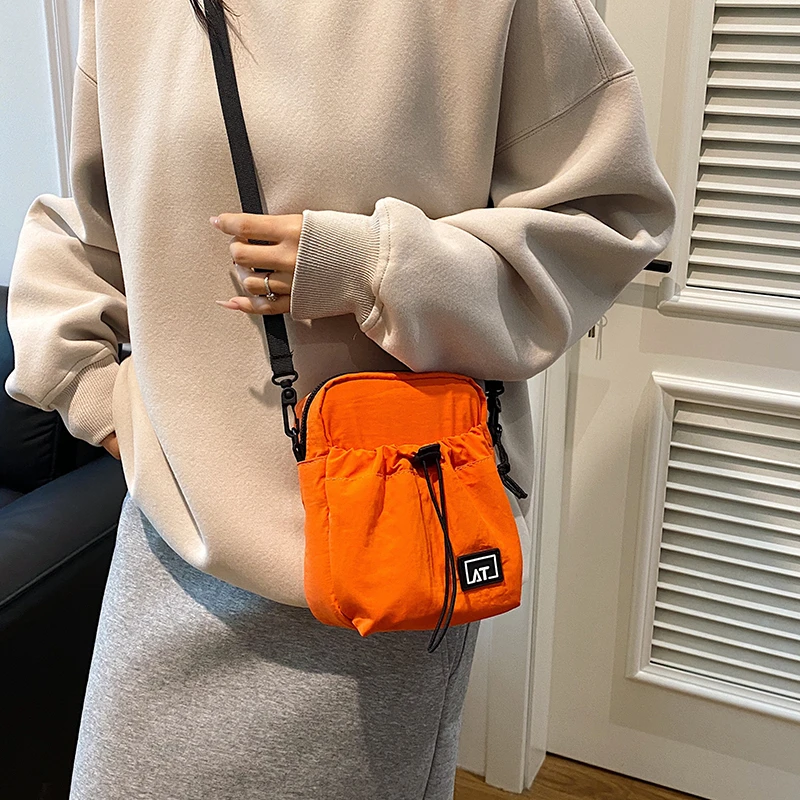 耐用迷你布包包女新款休闲时尚风手机包运动旅游骑行斜挎包小包男