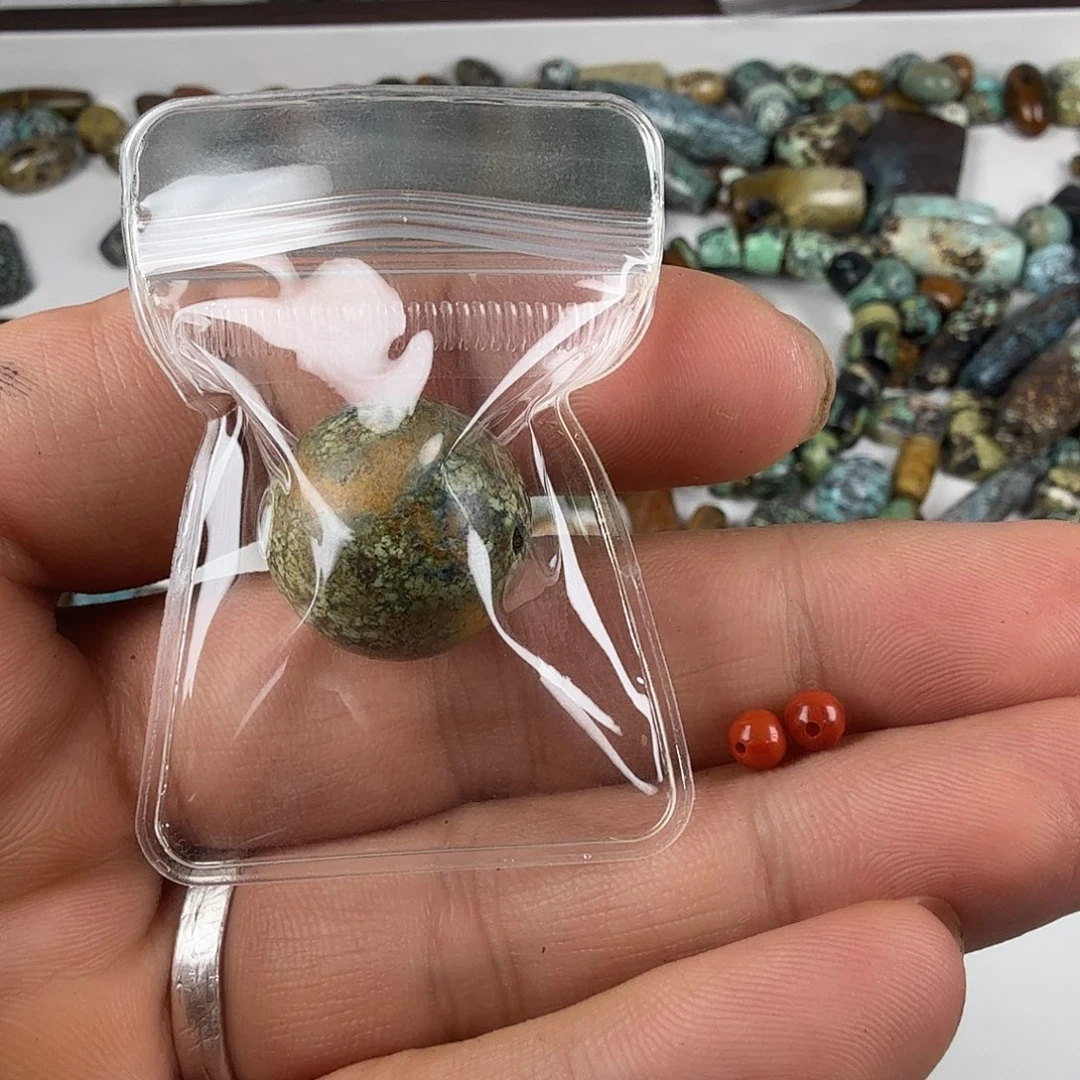 喵***吉未镶嵌南红玛瑙珠宝奇石
