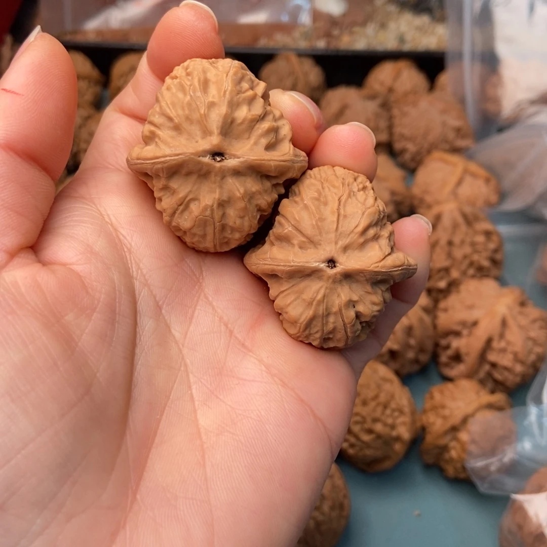 沐***家文玩核桃把件红方印11