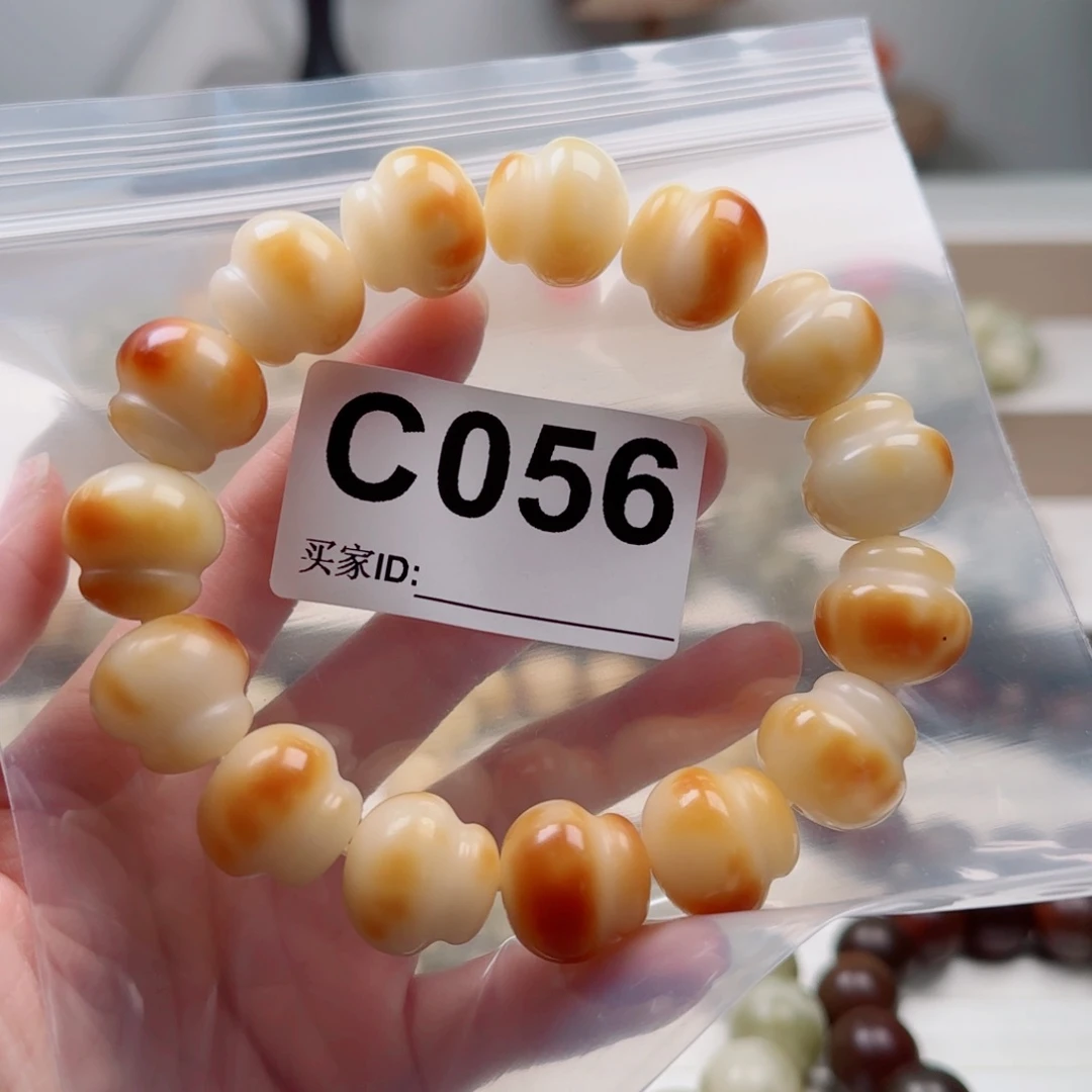 柚****菩提根/象牙果手串18微瑕。