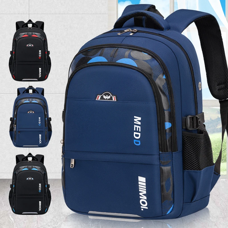 新款小学生书包男孩轻便减负护脊大容量防水耐磨3-6-9年级双肩包