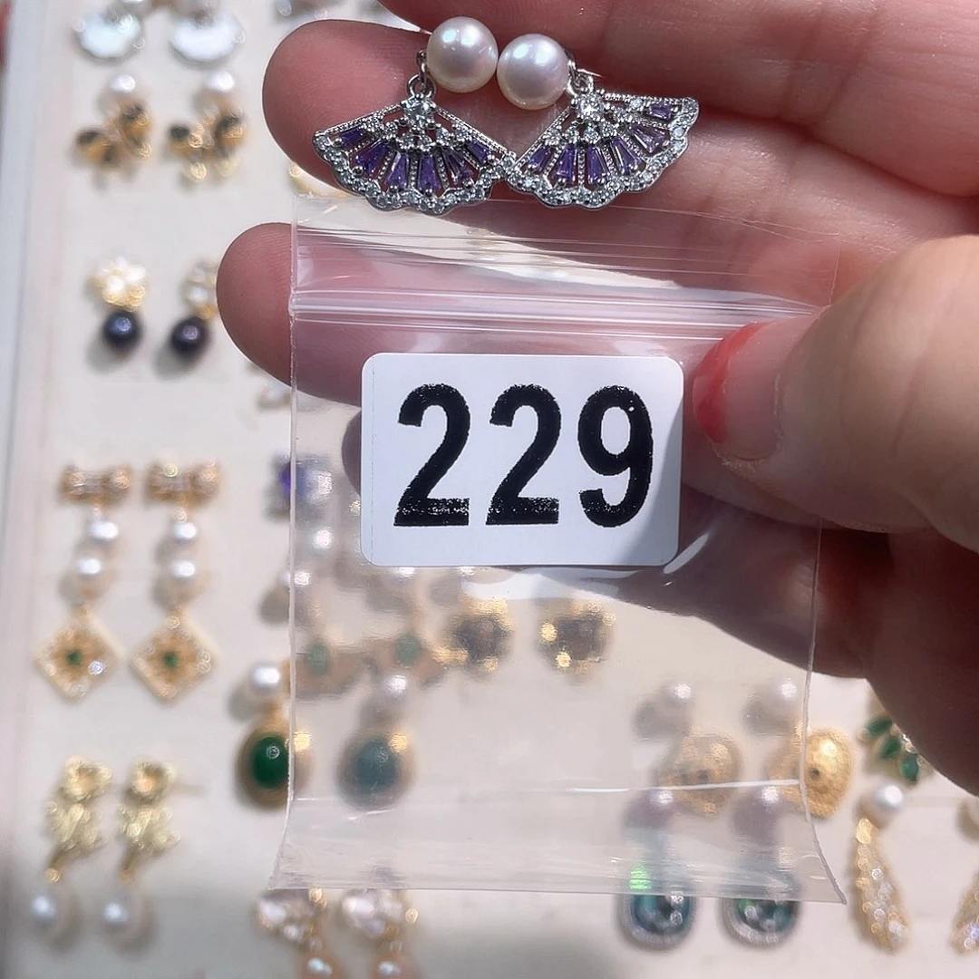 合金淡水珍珠耳饰曼*罗