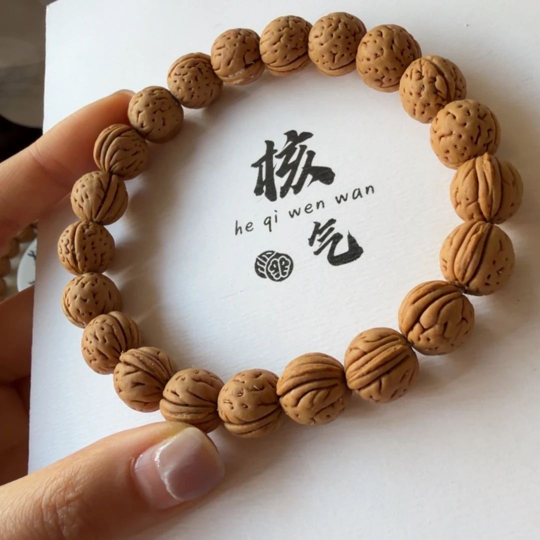 M***g芝麻汤圆桃核吊坠