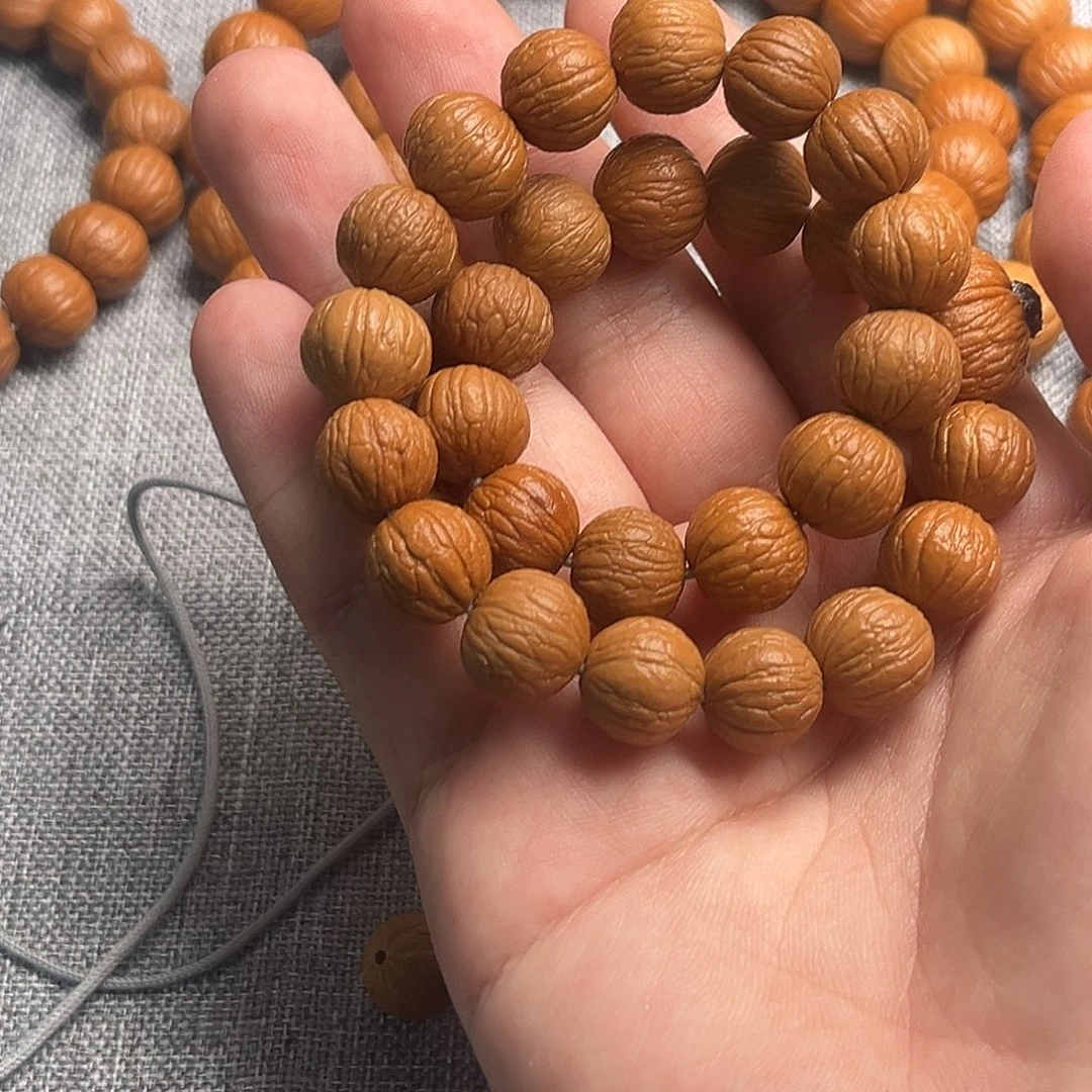 猴头核桃手串原皮凤羽