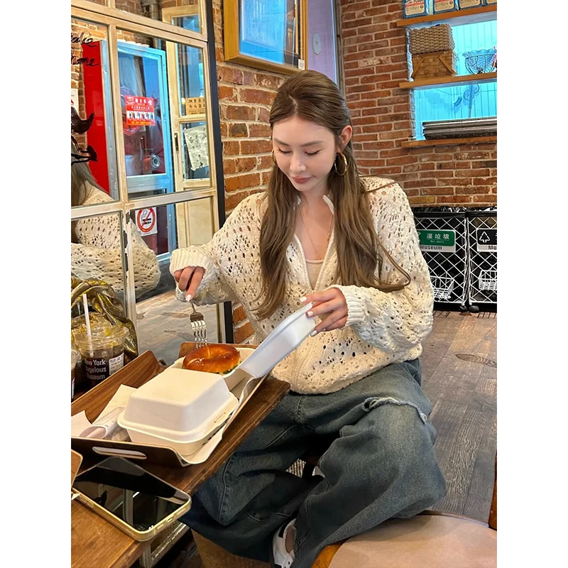 2025春季新款轻熟风纯欲性感设计缕空显瘦百搭长袖针织衫小众上衣