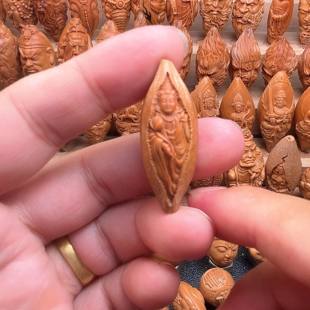 橄榄核吊坠17包衣观音