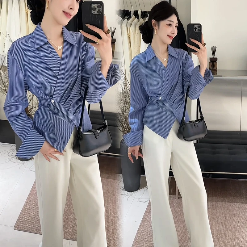 2025春季新款蓝色条纹设计感衬衫掐腰显瘦搭白色休闲裤精英时尚