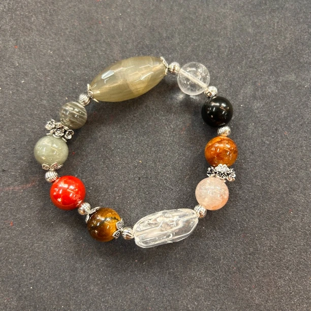 鹤童橄榄型多宝水晶手串0000