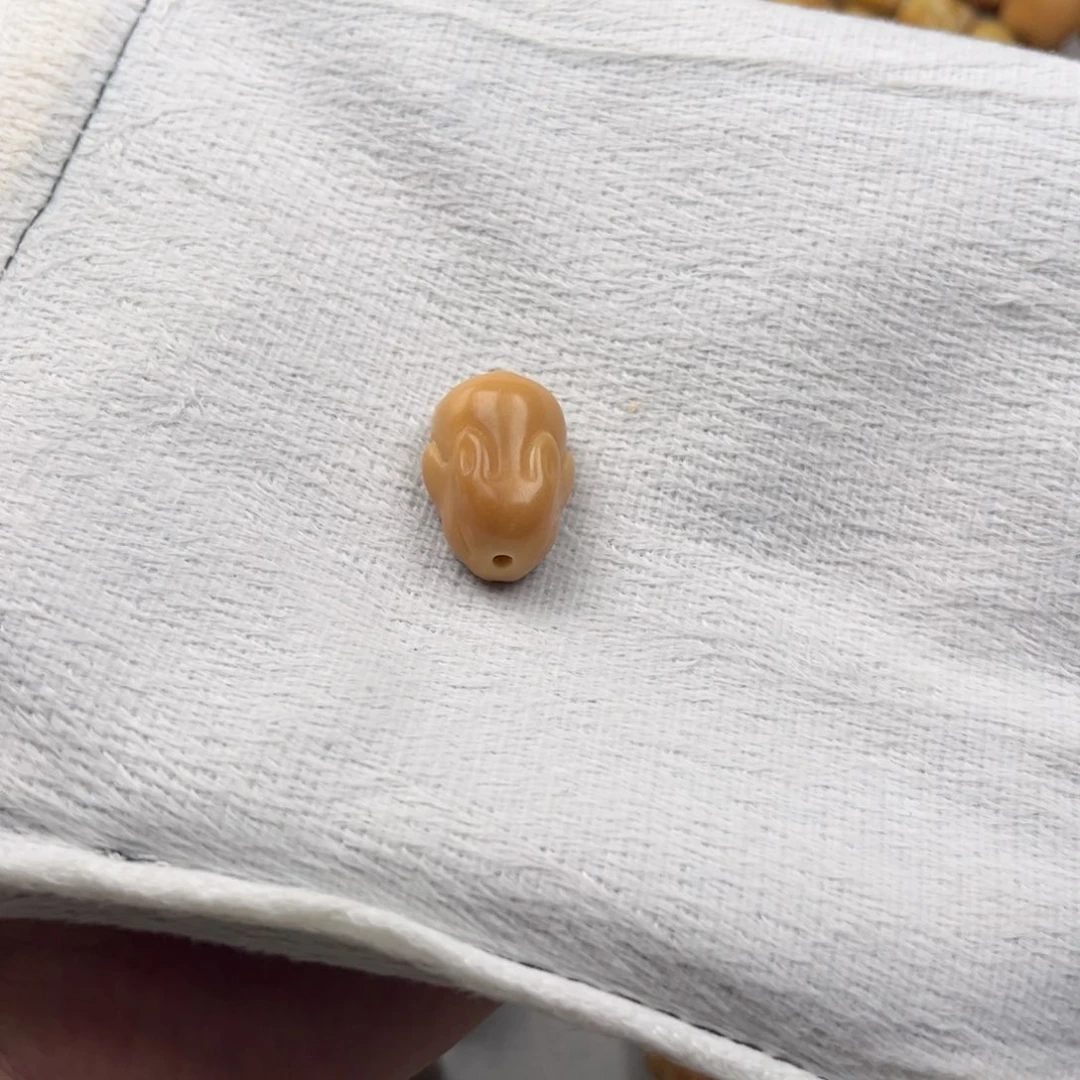 菩提根/象牙果吊坠是****?牙果风化趴趴兔一颗卡24+