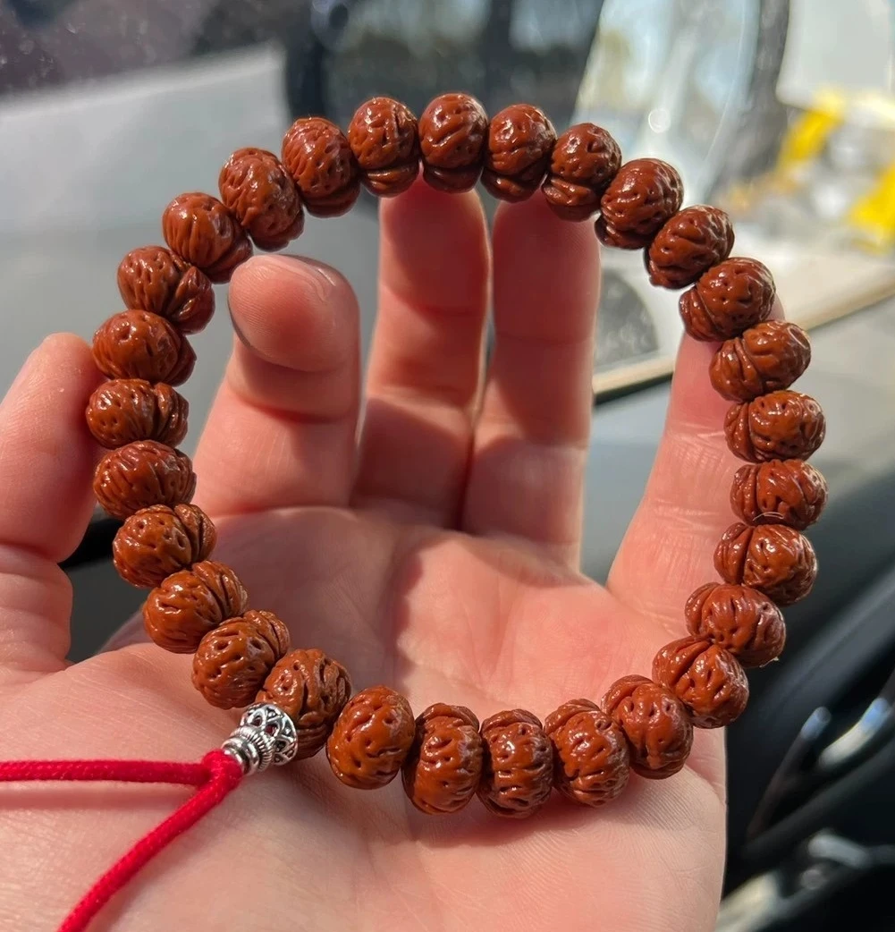 秦岭野生蟠桃核手持矮桩圆肚饱满圆润玉女脐精品文玩