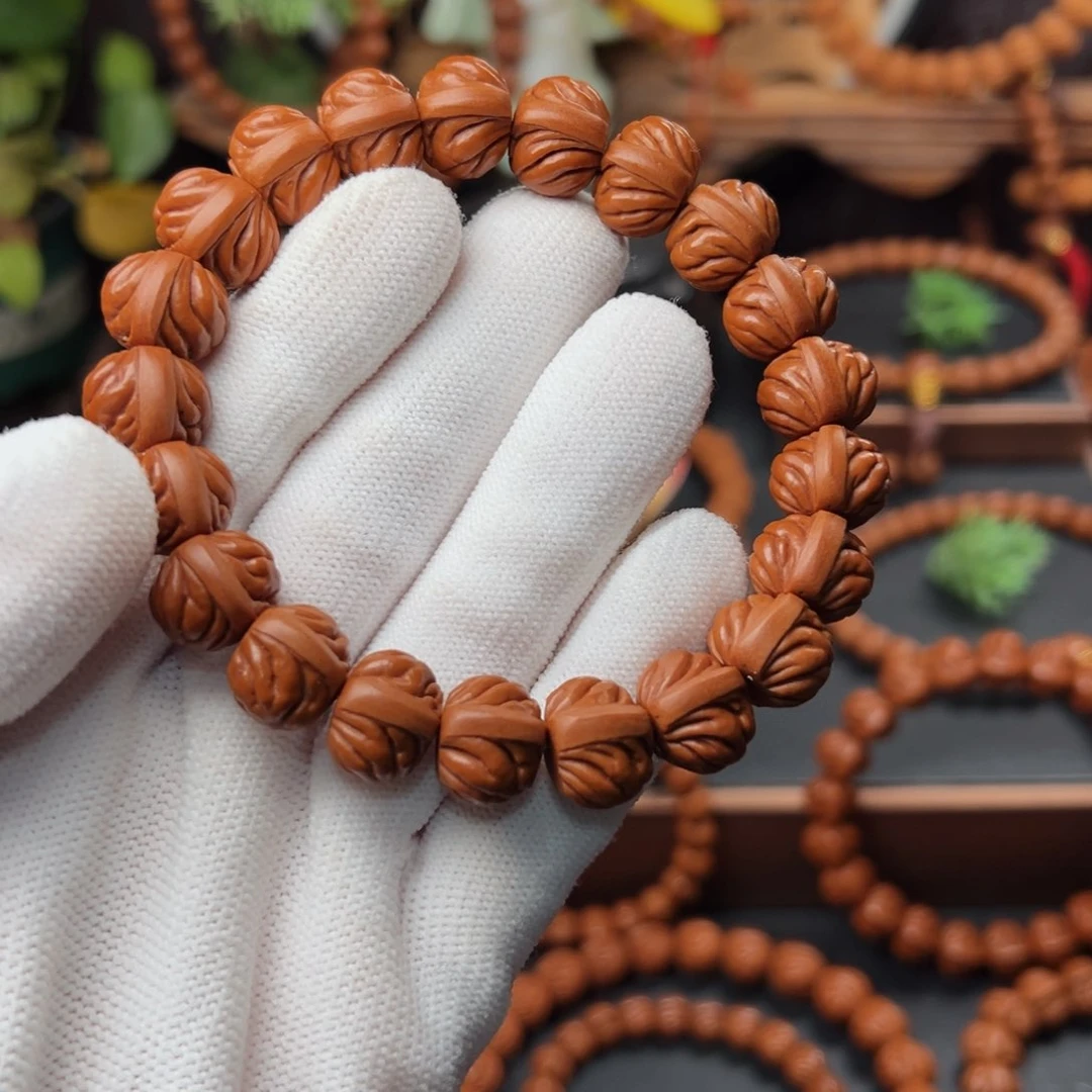 吊坠桃核ゞ****_1.4双脊龙手串